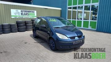 Koplamp links van een Mitsubishi Colt beschikbaar voor biedingen