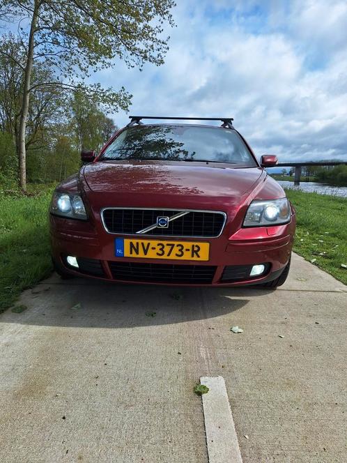 Volvo V50 2.5 T5 AWD Geartronic 2006 Rood metallic, Auto's, Volvo, Particulier, V50, 4x4, ABS, Airbags, Bluetooth, Centrale vergrendeling