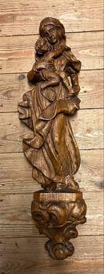 Groot houten mariabeeld., Ophalen