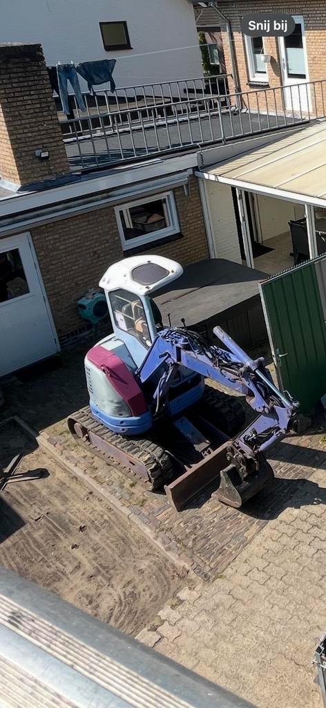 Komatsu PC12UU-2 binnendraaier minigraver in goede staat., Tuin en Terras, Aarde en Mest, Overige typen, Ophalen