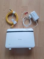 Zyxel T-54 modem met originele lader, Computers en Software, Routers en Modems, Ophalen of Verzenden, Zo goed als nieuw, Router met modem
