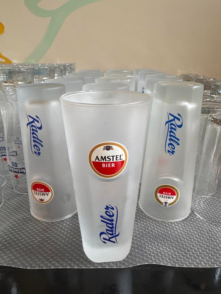 19 Amstel Radler glazen, Glas of Glazen, Gebruikt, Ophalen of Verzenden, Glas
