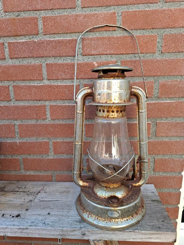 Leuke oude olie lantaren, Ophalen
