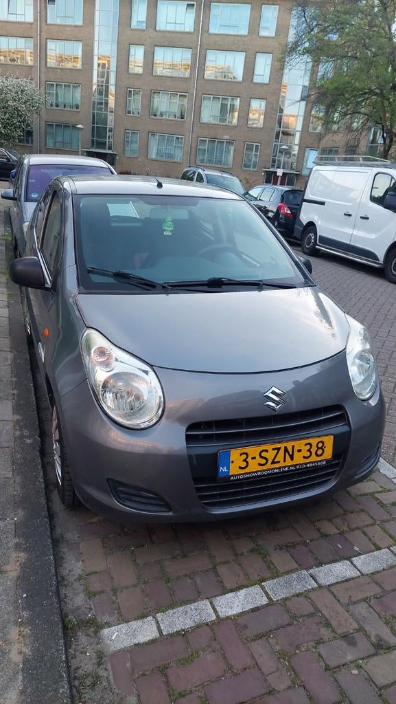 Suzuki Alto 1.0 2014 Grijs, Auto's, Suzuki, Voorwielaandrijving, Stof, 200 kg, 4 stoelen