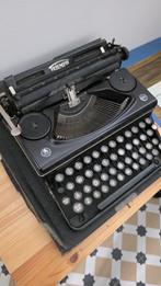 Oude typmachine van het merk Triumph, Ophalen