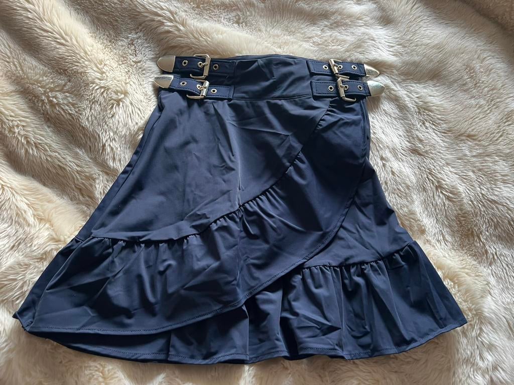 Nikkie mooi kort rokje van travelstof/ maat 34, Zo goed als nieuw, Maat 34 (XS) of kleiner, Boven de knie, Verzenden