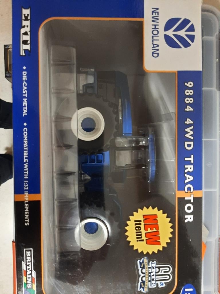 New Holland 9884 kniktractor.  Ertl schaal 1:32., Ophalen of Verzenden, Nieuw, Tractor of Landbouw, ERTL