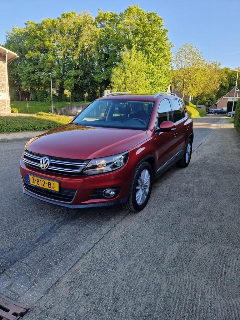 Volkswagen Tiguan 1.4 TSI 118KW BMT 2014 Rood, Auto's, Volkswagen, Particulier, Tiguan, ABS, Adaptieve lichten, Airbags, Airconditioning