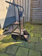 Laskar met dubbel plateau en gasfles plaats, Ophalen