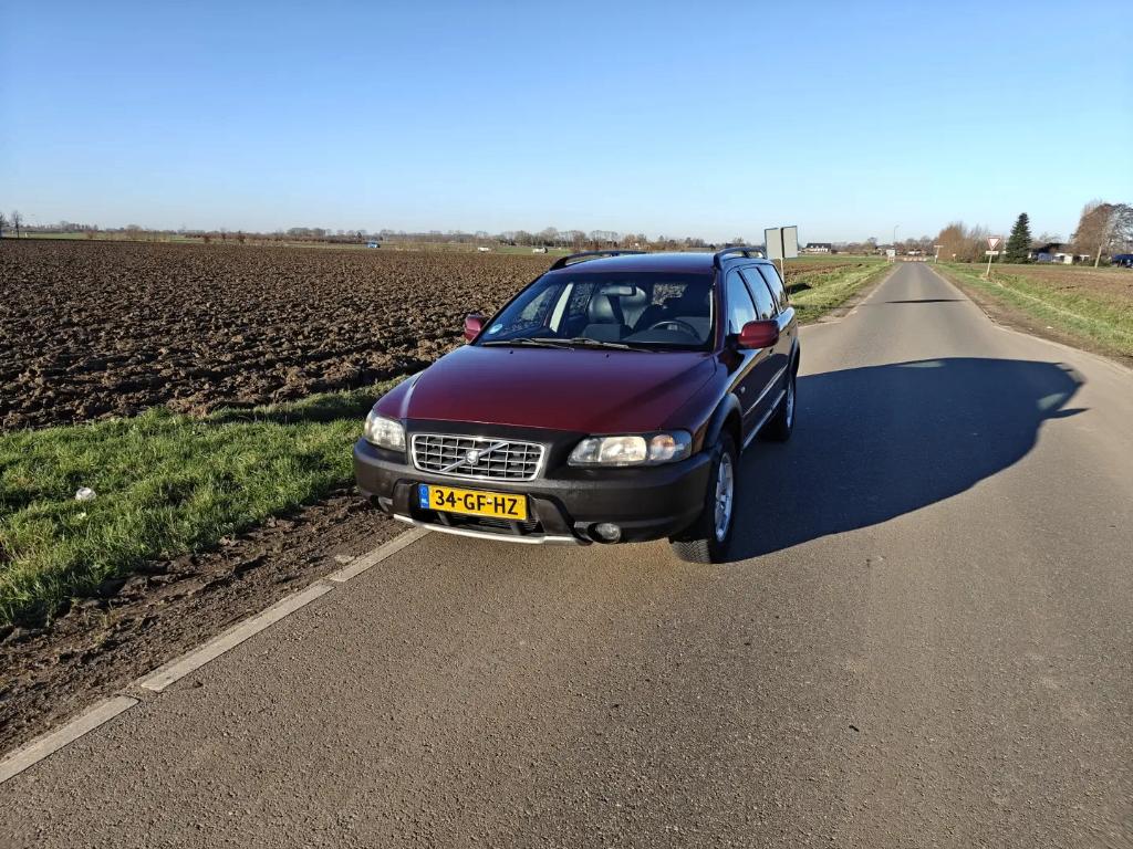 Volvo V70 2.4 T XC 4WD 2000 Rood, Auto's, Volvo, 1800 kg, Zwart, Leder en Stof, Stationwagon