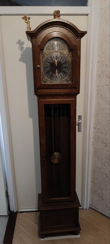 Antieke staande klok, Ophalen