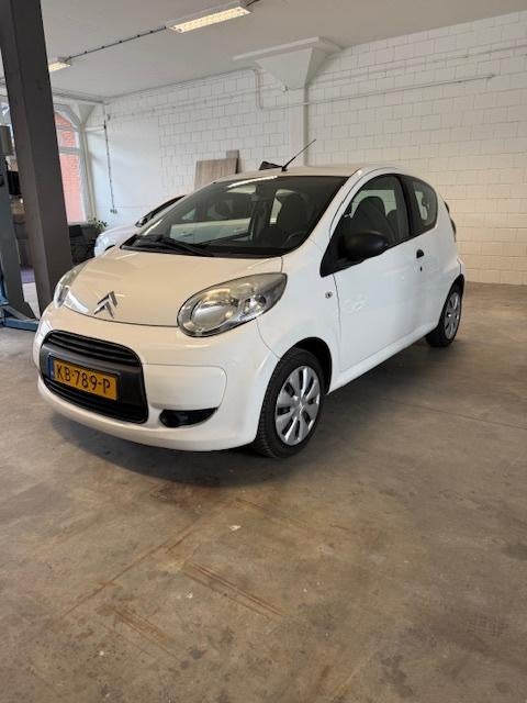 Citroën C1 1.0 3-DRS 2010 Wit, Auto's, Voorwielaandrijving, 4 stoelen, C1, Bedrijf