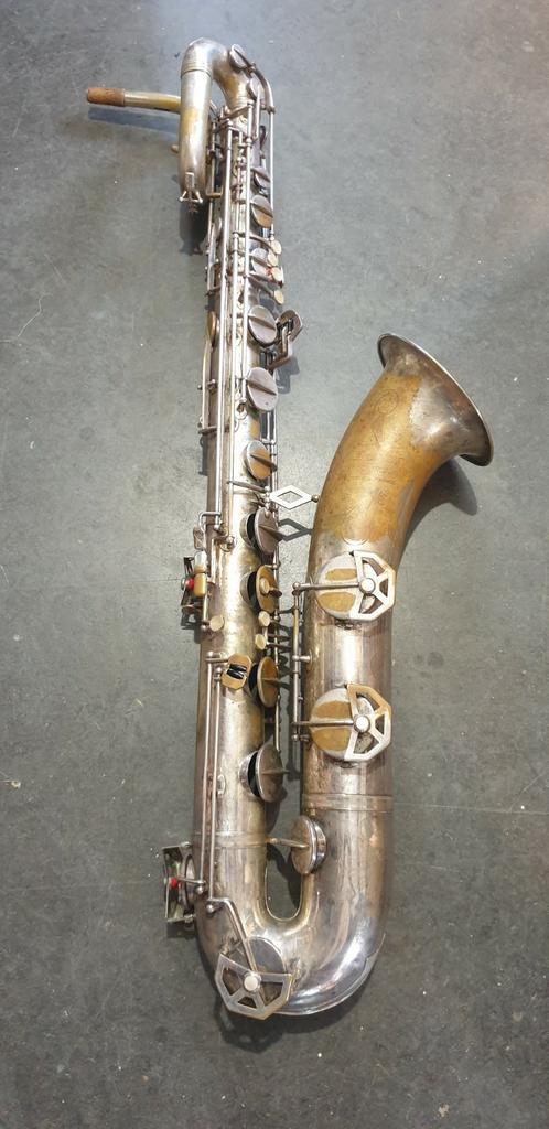 Bariton saxofoon Dolnet, Muziek en Instrumenten, Blaasinstrumenten | Saxofoons, Gebruikt, Bariton, Met koffer, Ophalen of Verzenden