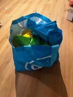 Tas vol bigshoppers, Ophalen