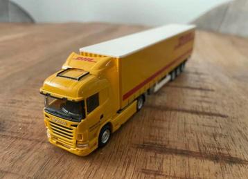 Herpa Scania R serie van DHL met zeilenoplegger beschikbaar voor biedingen