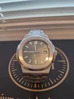 Patek Philippe Nautilus met groene wijzerplaat, Sieraden, Tassen en Uiterlijk, Horloges | Heren, Ophalen of Verzenden, Zo goed als nieuw