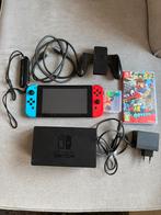 Nintendo Switch + toebehoren + Super Mario Odyssey, Spelcomputers en Games, Ophalen of Verzenden, Zo goed als nieuw, Met 2 controllers