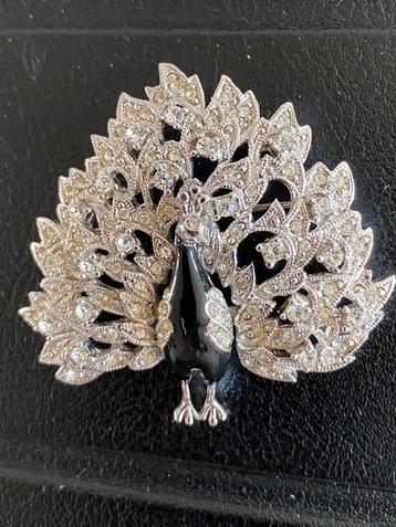 Pauwen broche beschikbaar voor biedingen