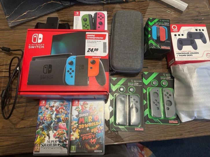 Nintendo Switch + 4 spellen + accessoires - Compleet pakket, Spelcomputers en Games, Games | Nintendo Switch, Gebruikt, Overige genres