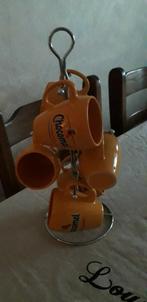 Chocomel bekers met houder, Huis en Inrichting, Keuken | Servies, Ophalen, Zo goed als nieuw, Overige stijlen, Kop(pen) en/of Schotel(s)