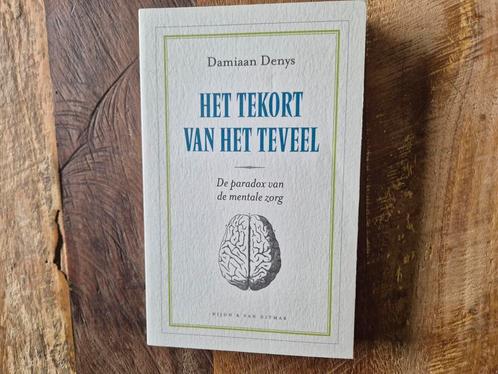 Damiaan Denys - Het tekort van het teveel, Boeken, Overige Boeken, Zo goed als nieuw, Ophalen of Verzenden