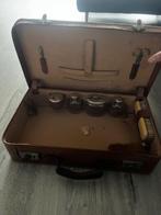 Antieke ledere koffer, Ophalen