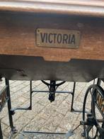 Antieke tafel naaimachine, Ophalen
