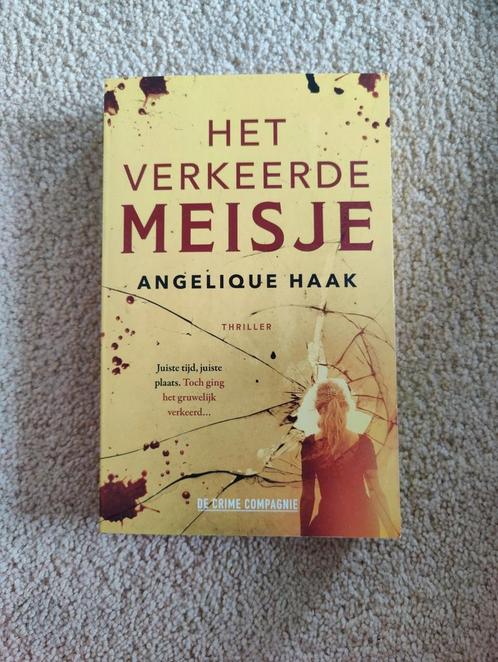 Angelique Haak - Het verkeerde meisje, Boeken, Thrillers, Zo goed als nieuw, Nederland, Ophalen of Verzenden