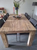 Houten eettafel en grijze kunstleren stoelen, Ophalen
