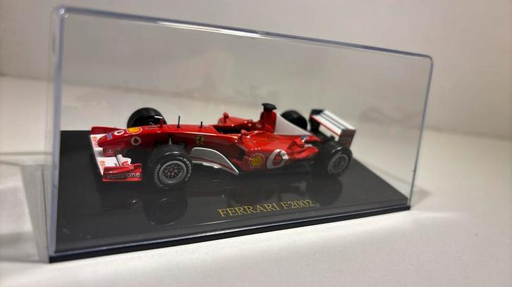 F1 ferrari m.Schumacher 2002 atlas 1.43, Hobby en Vrije tijd, Modelauto's | 1:43, Zo goed als nieuw, Auto, Overige merken, Ophalen of Verzenden