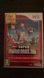 New super mario bros wii compleet met handleiding, Spelcomputers en Games, Eén computer, Ophalen of Verzenden, Zo goed als nieuw