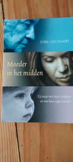 Sybil Lockhart - Moeder in het midden, Boeken, Sybil Lockhart, Ophalen of Verzenden, Zo goed als nieuw