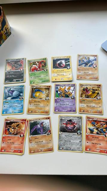 Pokémon Rising Rivals trainer cards.