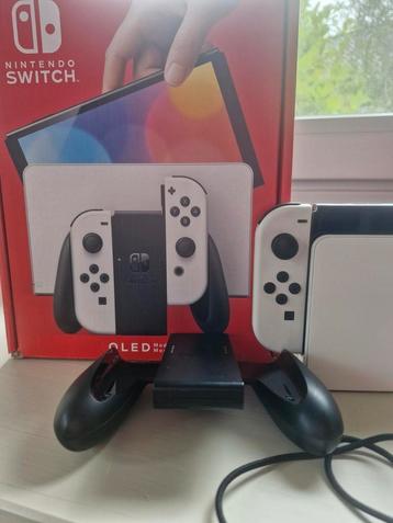 Nintendo Switch OLED (wit) met 5 spellen en draagkoffer beschikbaar voor biedingen