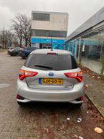 Toyota Yaris 1.5 Hybrid 100pk CVT 2020 Grijs/Y20, Auto's, Toyota, 1497 cc, 74 pk, 4 cilinders, Yaris