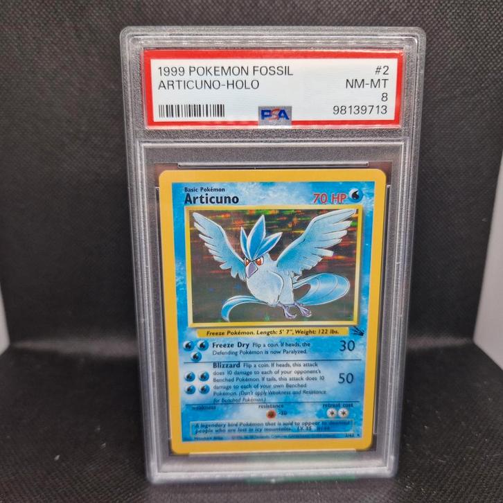Articuno Holo Fossil PSA 8, Hobby en Vrije tijd, Verzamelkaartspellen | Pokémon, Zo goed als nieuw, Ophalen of Verzenden