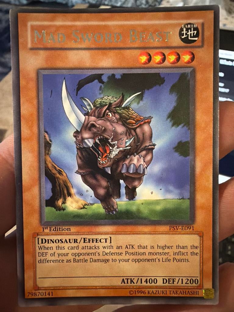 Yu-Gi-Oh! Mad Sword Beast - 1st Edition PSV-E091, Ophalen of Verzenden, Zo goed als nieuw, Losse kaart