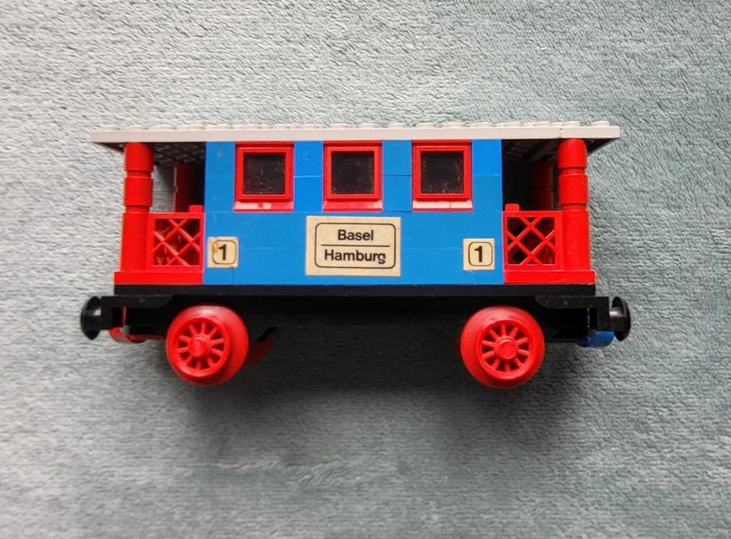 Lego trein 4,5 & 12 Volt blauwe rails passagier wagon., Ophalen of Verzenden, Gebruikt, Complete set, Lego