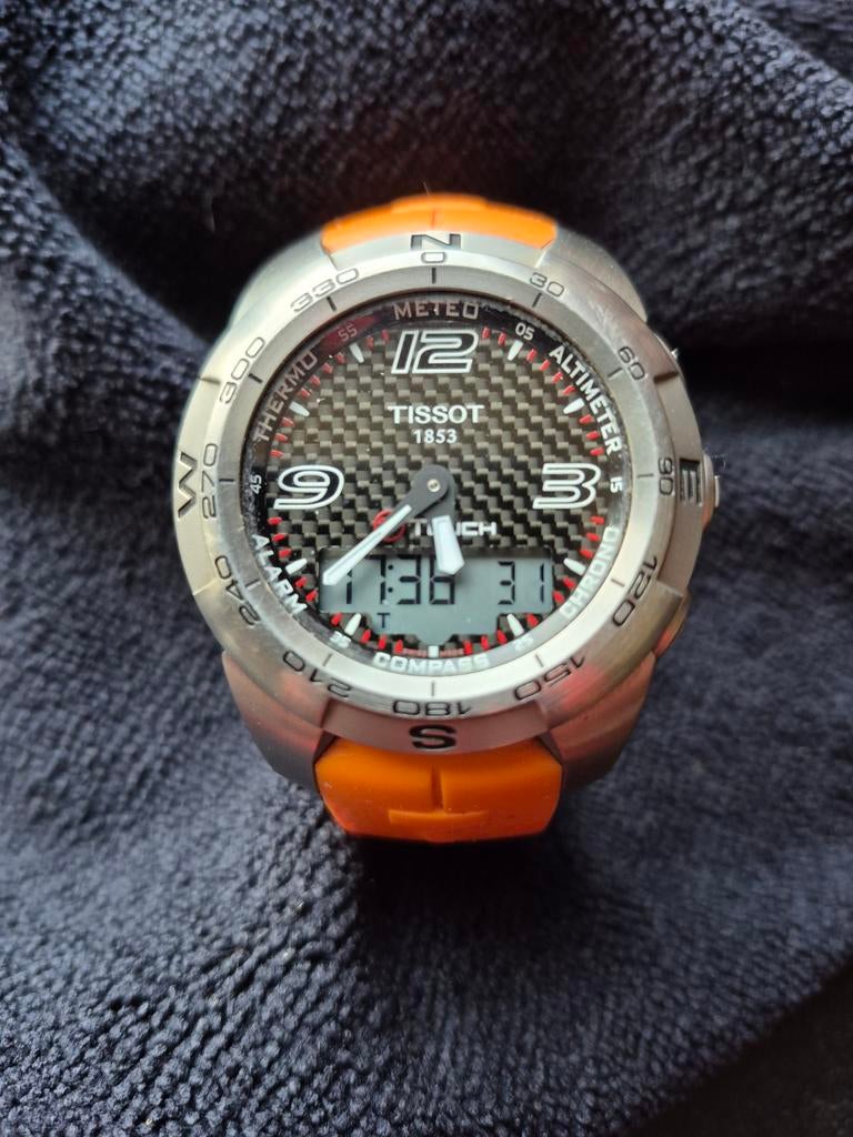 Tissot T-touch titanium oranje zgan, Ophalen of Verzenden, Zo goed als nieuw, Kunststof, Overige merken