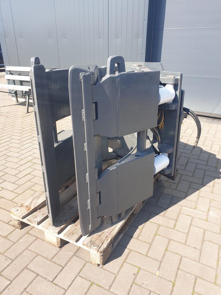 Roterende balenklem, Ophalen