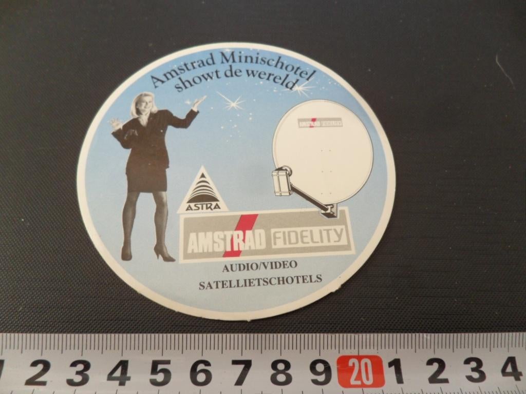 sticker amstrad minischotel showt de wereld audio/video, Ophalen, Zo goed als nieuw
