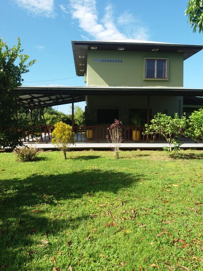 Prachtig Eigendomsperceel (4,7ha) met 2 Woningen – Suriname