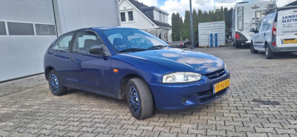 Mitsubishi Colt 1.3 Glxi AUT 1998 Blauw, 1299 cc, Stof, 74 pk, 31 €/maand
