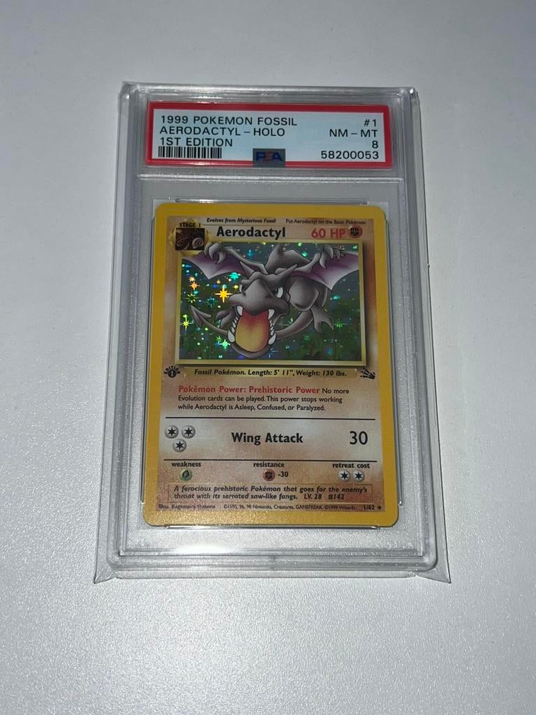 PSA 8 Pokémon Fossil Aerodactyl 1st Ed., Ophalen of Verzenden, Zo goed als nieuw