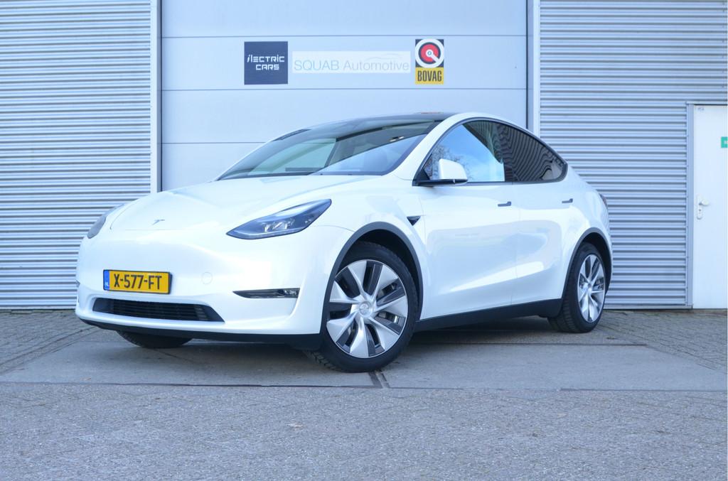 Tesla Model Y Long Range AWD 75 kWh Trekhaak (1.600kg) AutoP, Auto's, Tesla, 12 maanden, Adaptive Cruise Control, Zwart, Wit