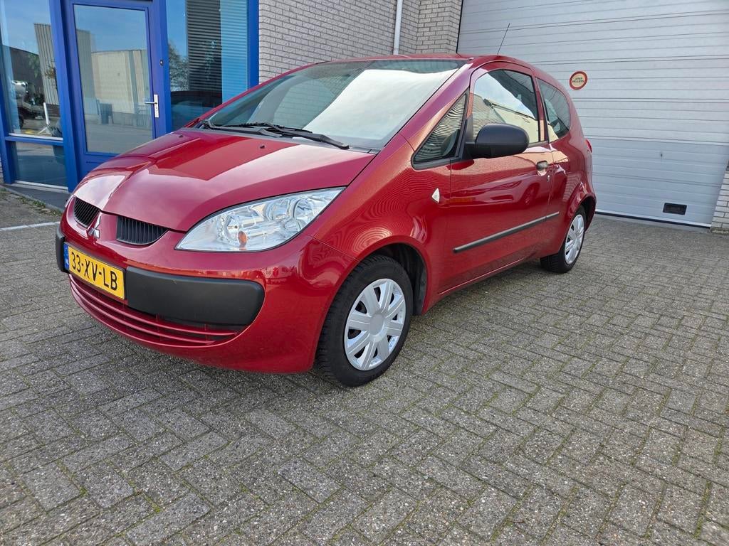 Mitsubishi Colt 1.3 Mivec CZ3 2007 Rood, Auto's, Voorwielaandrijving, Stof, Colt, Origineel Nederlands