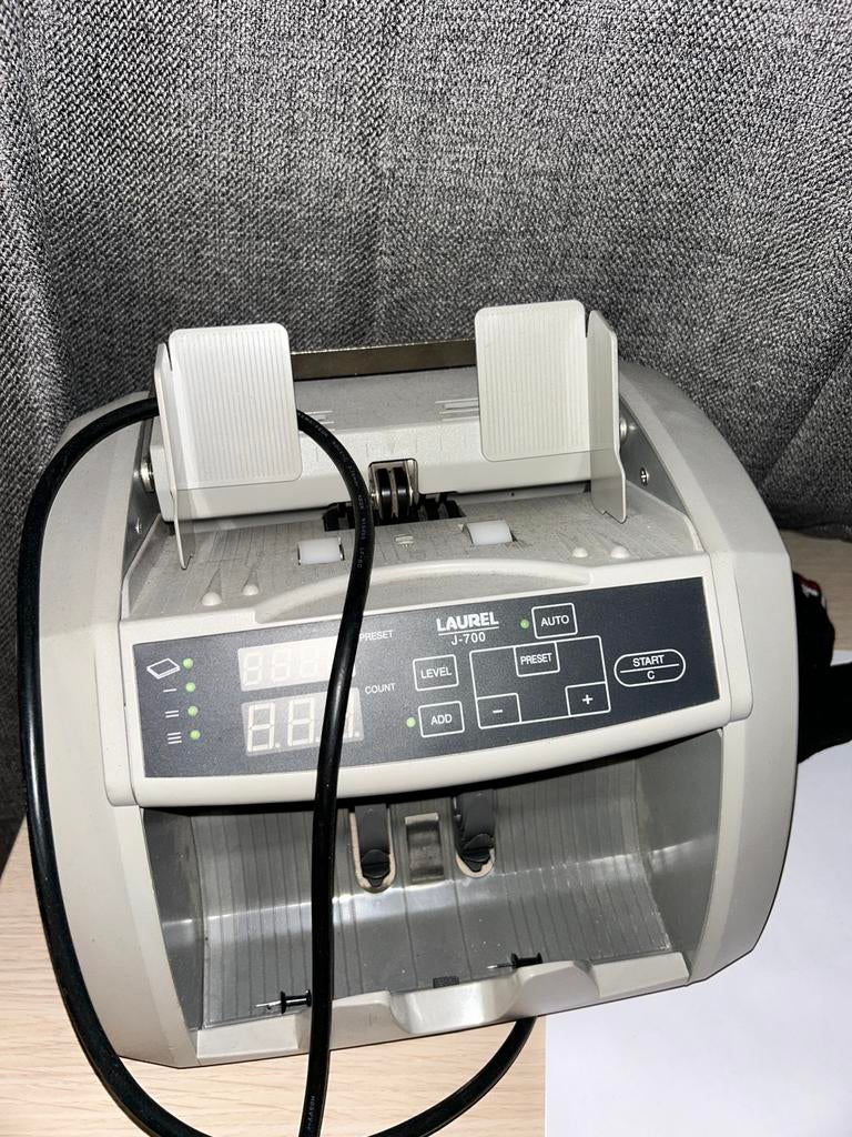 Geldtel machine, Ophalen, Gebruikt