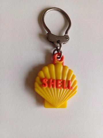 Oud shell sleutelhanger groot model 1 kant logo beschikbaar voor biedingen