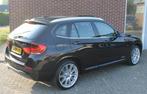 BMW X1 xDrive 20i 184pk Aut. High Executive, 15 km/l, Euro 6, 4 cilinders, Zwart