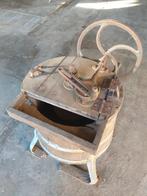 Antieke houten wasmachine, Ophalen